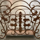 Antique wrought iron magazine holder